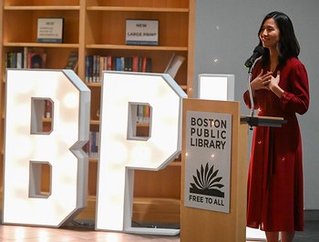 Mayor Wu at a speaking at a podium