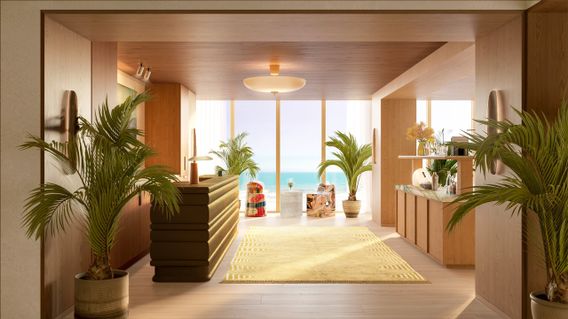 Modern room with large windows overlooking the ocean, featuring potted plants, a yellow rug, and wooden furniture. Bright and airy atmosphere.