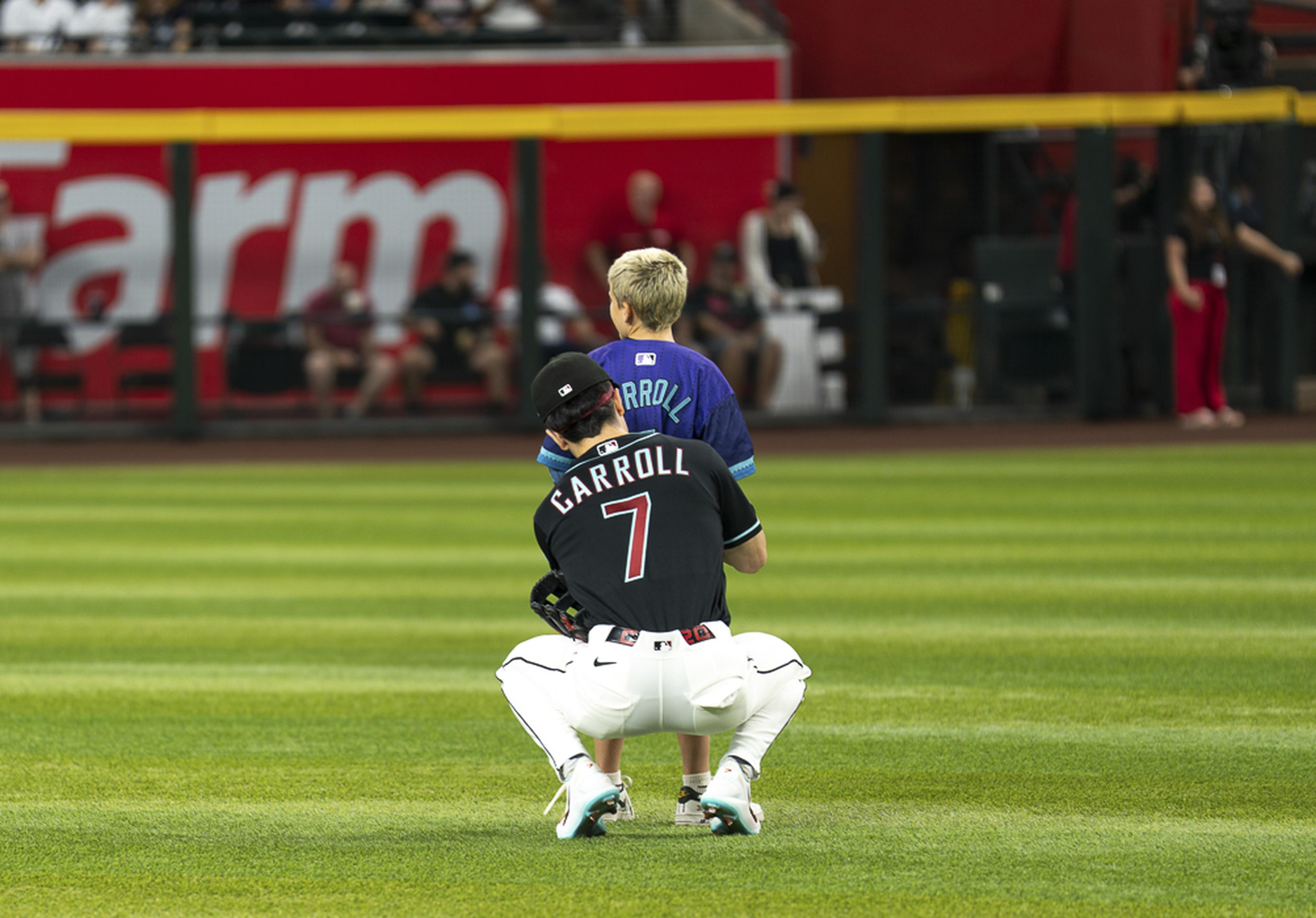 A young fan gets the chance to chat with Arizona Diamondbacks outfielder Corbin Carroll on the field, turning a dream-come-true Kids Take the Field experience into a lifelong memory.