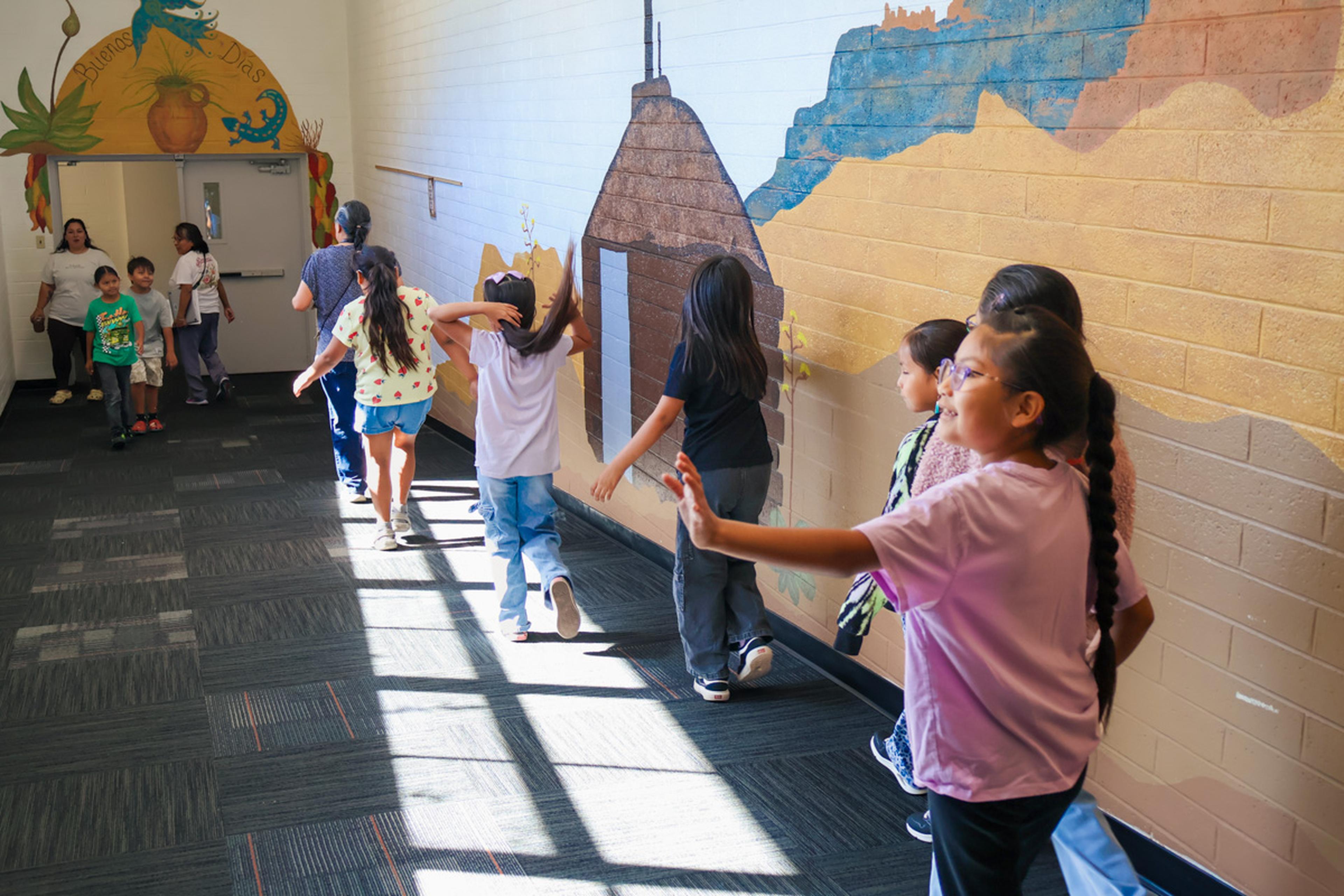 Students make their way through the colorful halls of Puente de Hózhó Elementary, starting another day filled with learning, discovery, and new opportunities.