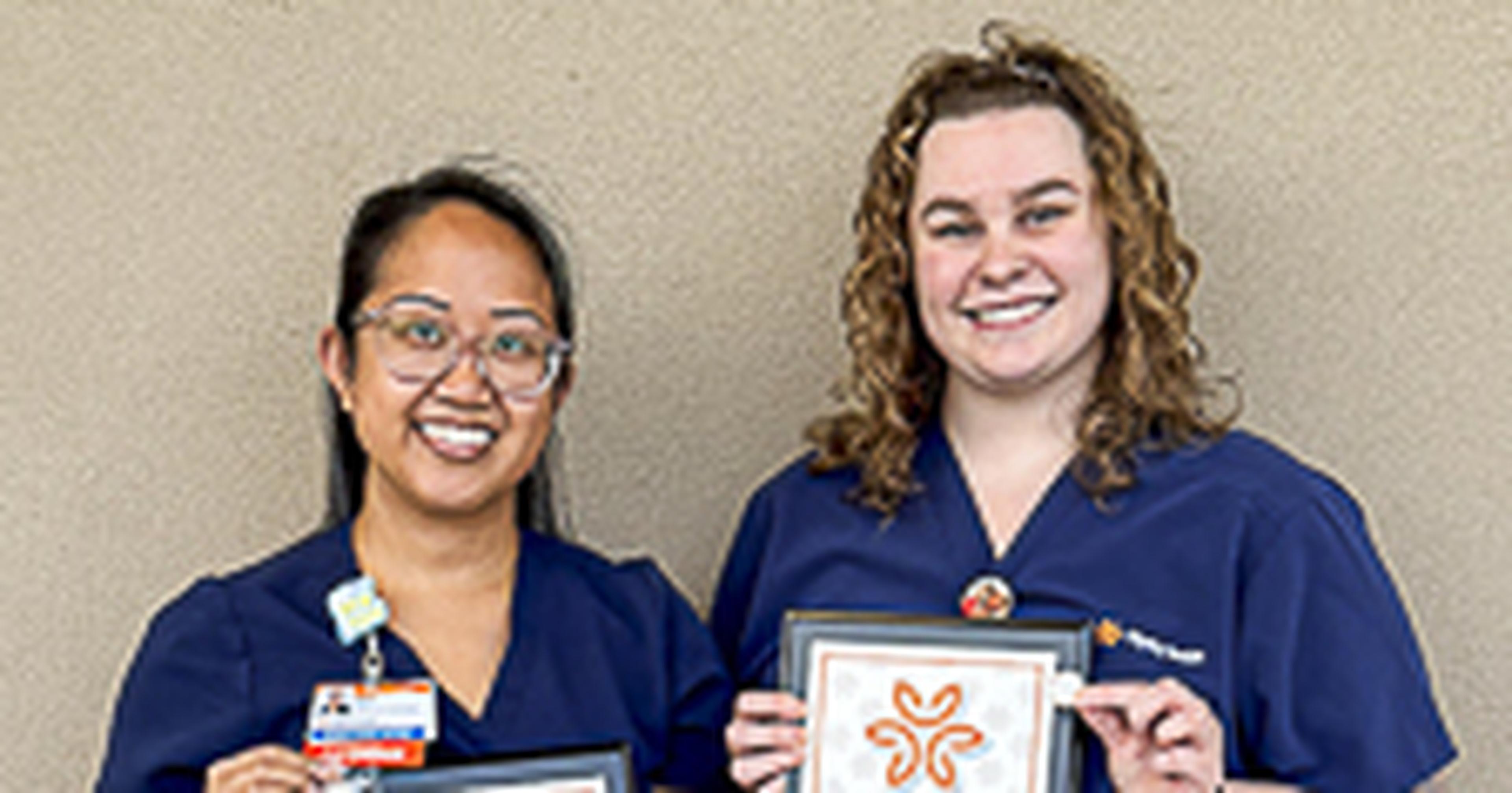 Nurses Marissa and Audi proudly display their Guardian Angel Awards, recognizing their dedication, compassion, and commitment to exceptional patient care.
