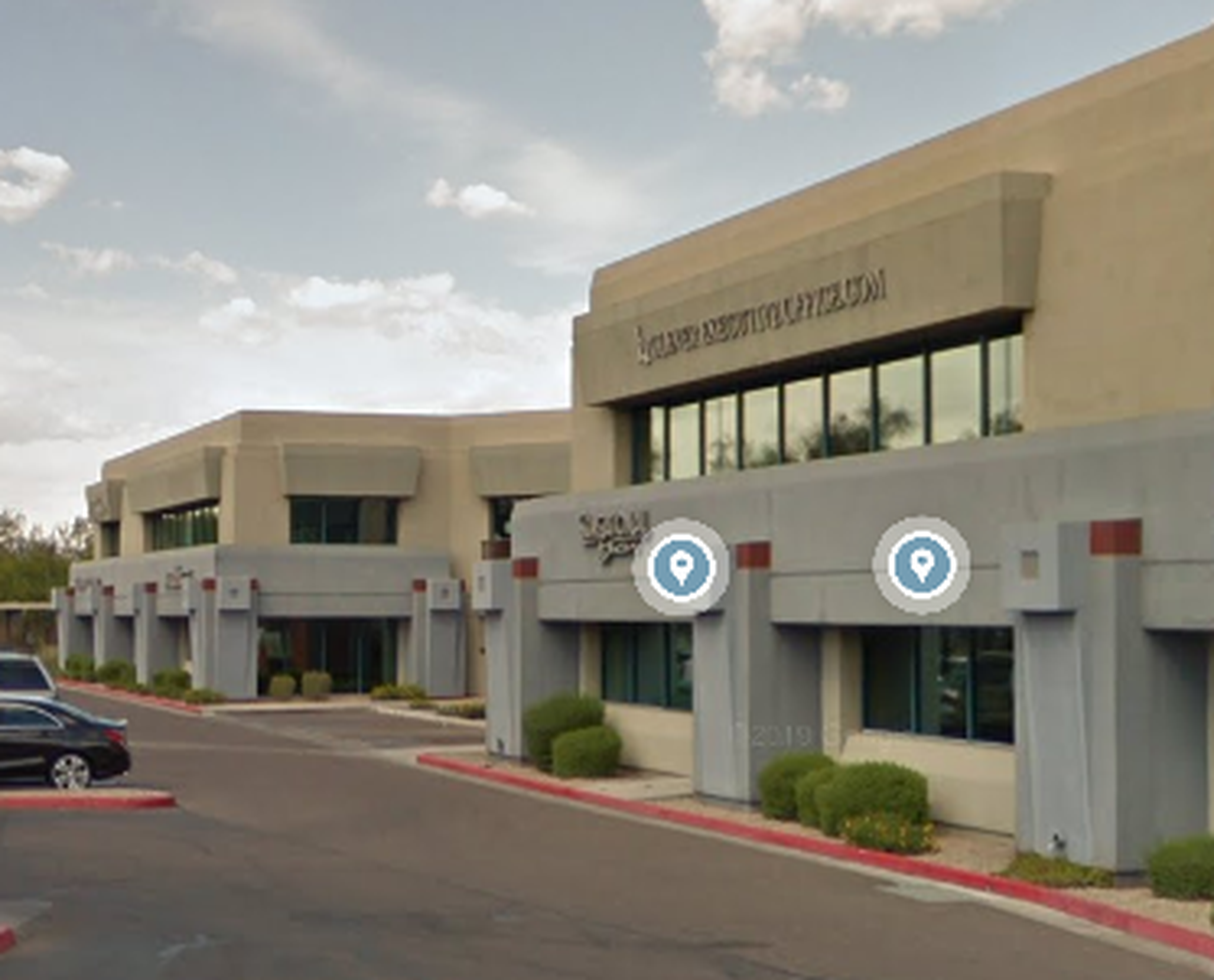 Husband and Wif eLaw Team Office at 11111 N. Scottdale Rd