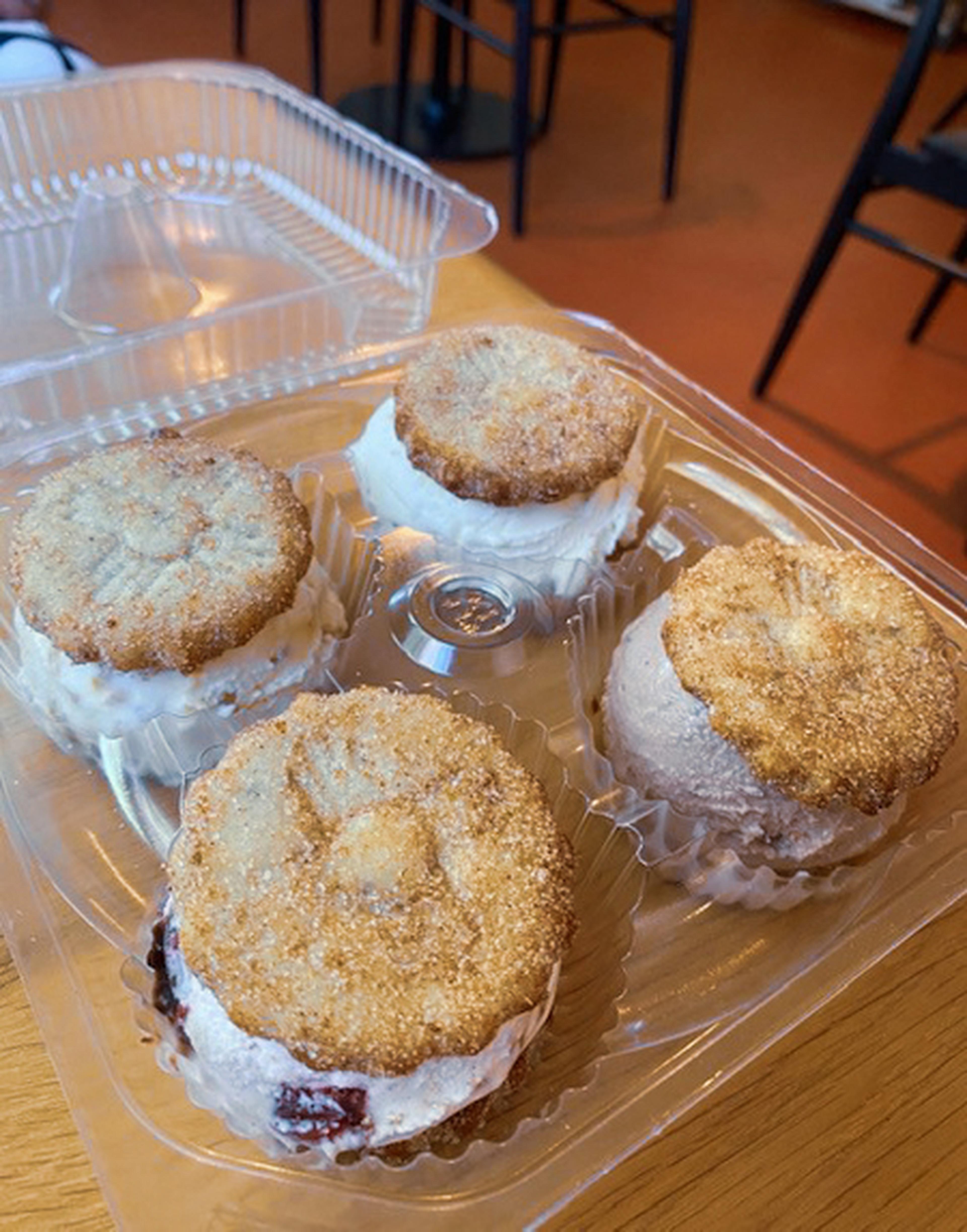 Four biscochito ice cream sandwiches in a to-go container