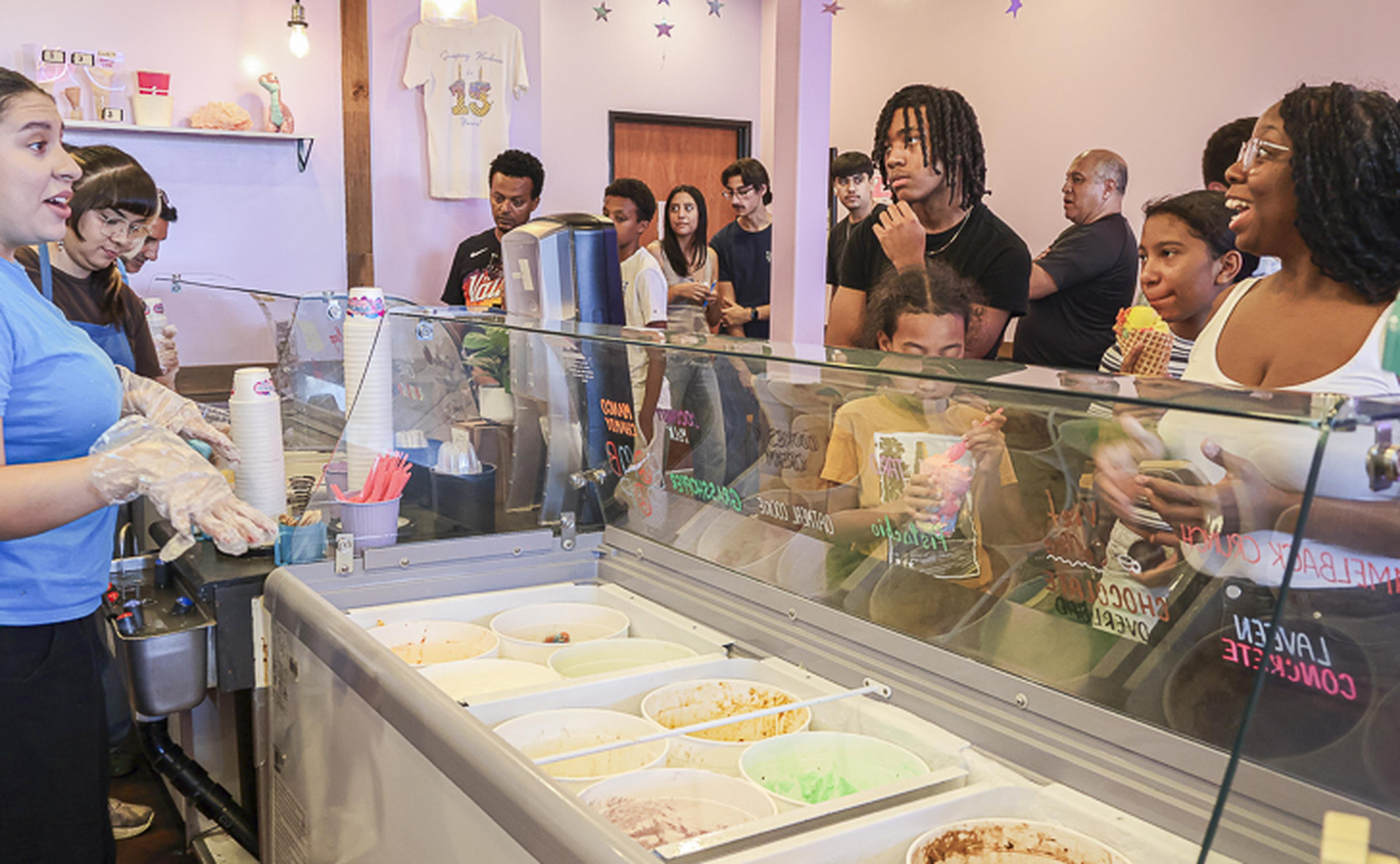 Guests line up at the SCOOPTACULAR HEART Event, eager to enjoy a sweet treat while connecting with friends and neighbors in the community.
