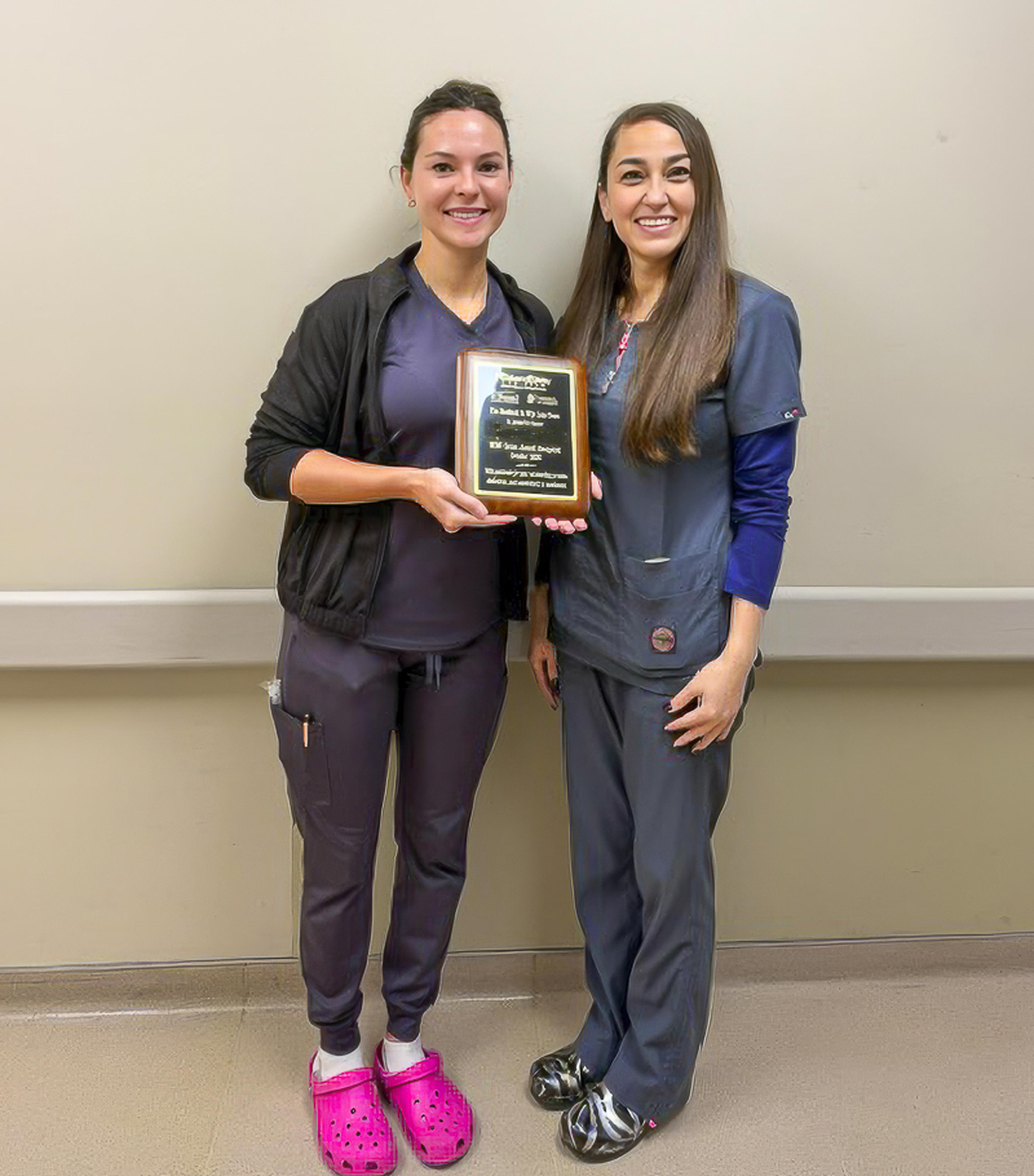 Nurse Cheyenne proudly receives the Husband & Wife Law Team’s WOW Award, recognizing her outstanding dedication to healthcare in Santa Fe, New Mexico.
