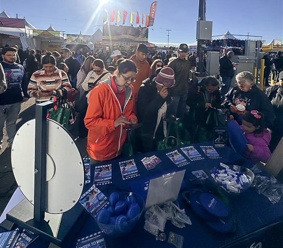 The Husband & Wife Law Team welcomes Balloon Fiesta visitors to our booth for free goodies, fun activities, and plenty of smiles under the Albuquerque sun.