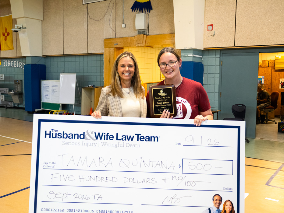 Ms. Quintana proudly displays her Teacher Appreciation plaque and $500 award from the Husband & Wife Law Team, recognizing her outstanding dedication to students at Chaparral Elementary School.
