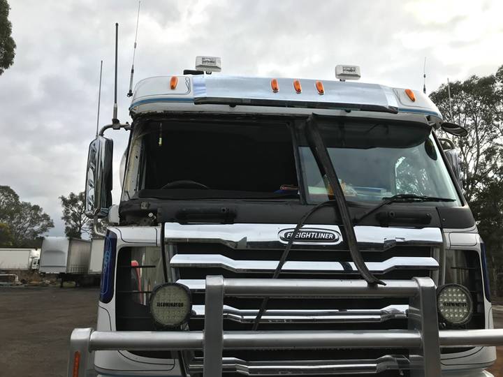 Truck cab with the damaged windscreen removed