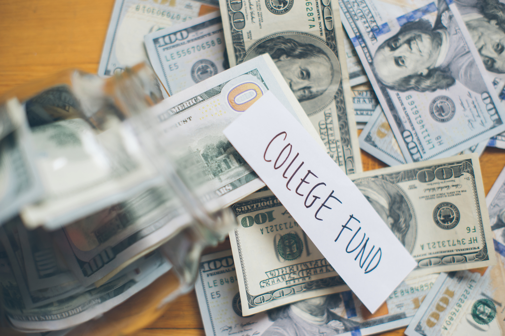 Student working on financial aid applications and scholarship paperwork