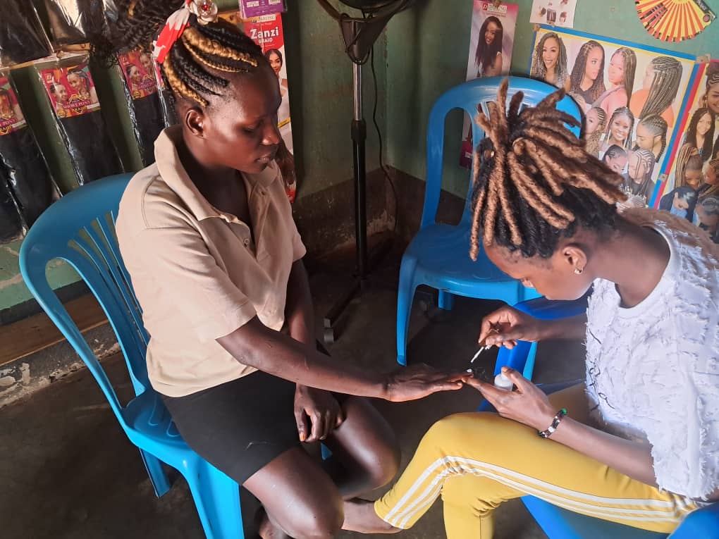 applying nail polish girl