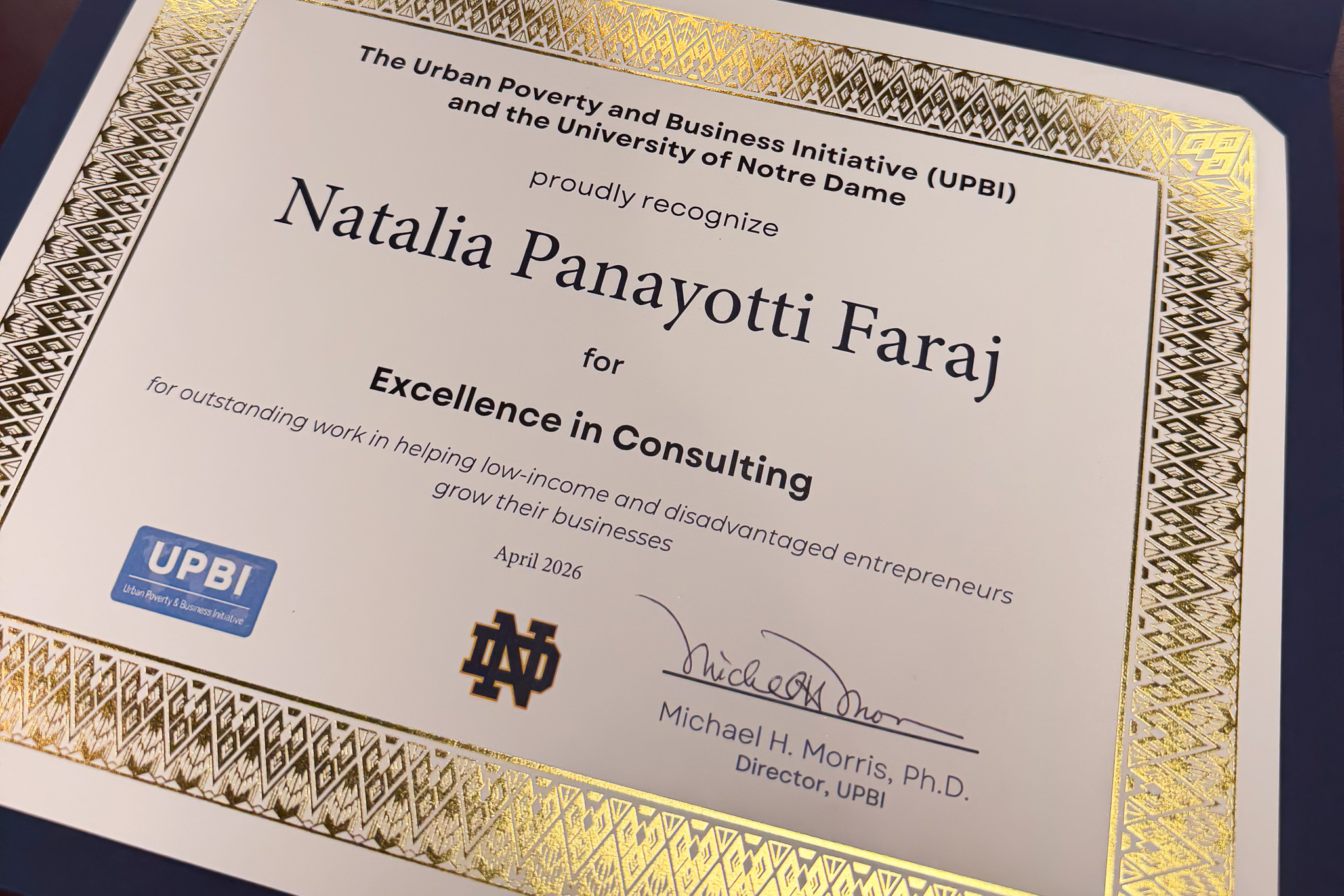 Certificate awarded to Natalia Panayotti Faraj for Excellence in Consulting by UPBI and University of Notre Dame, April 2026.