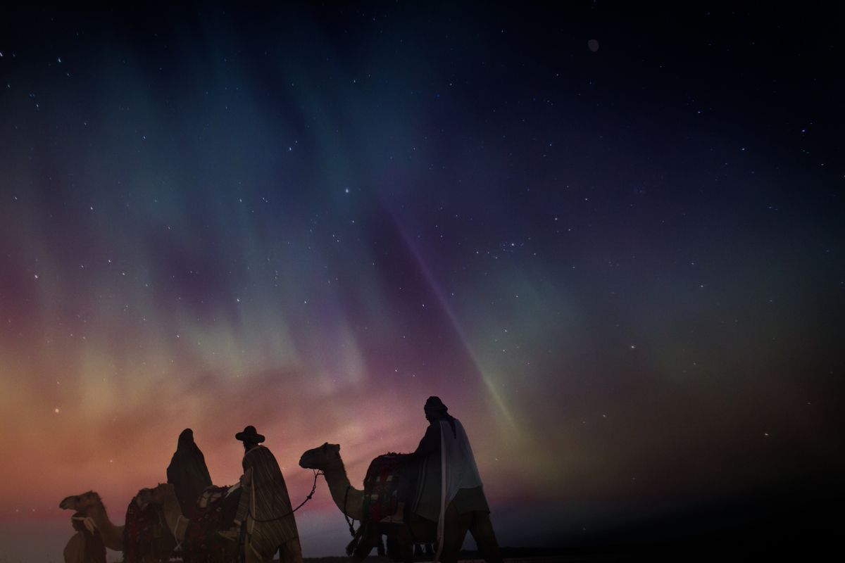 Image of 3 men on camels representing Epiphany