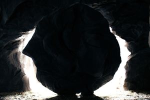 Image of a rock tomb being opened