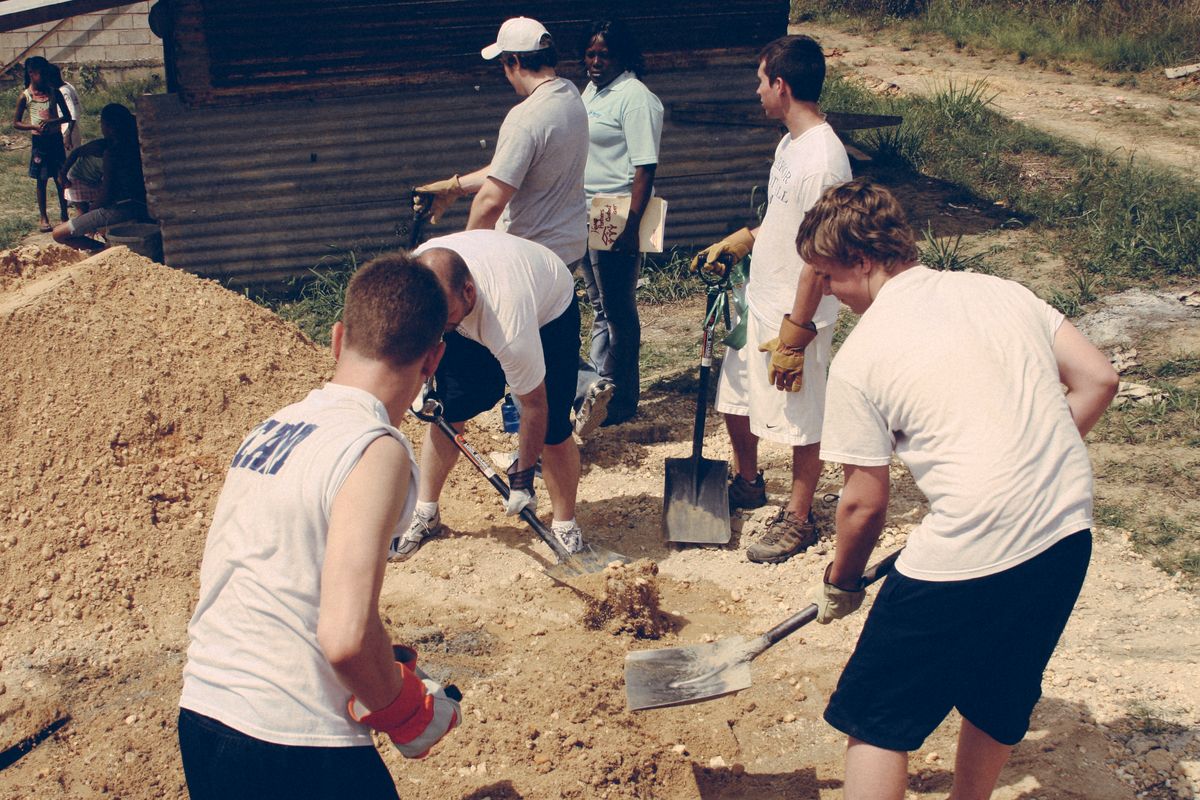 People digging a foundation with shovels