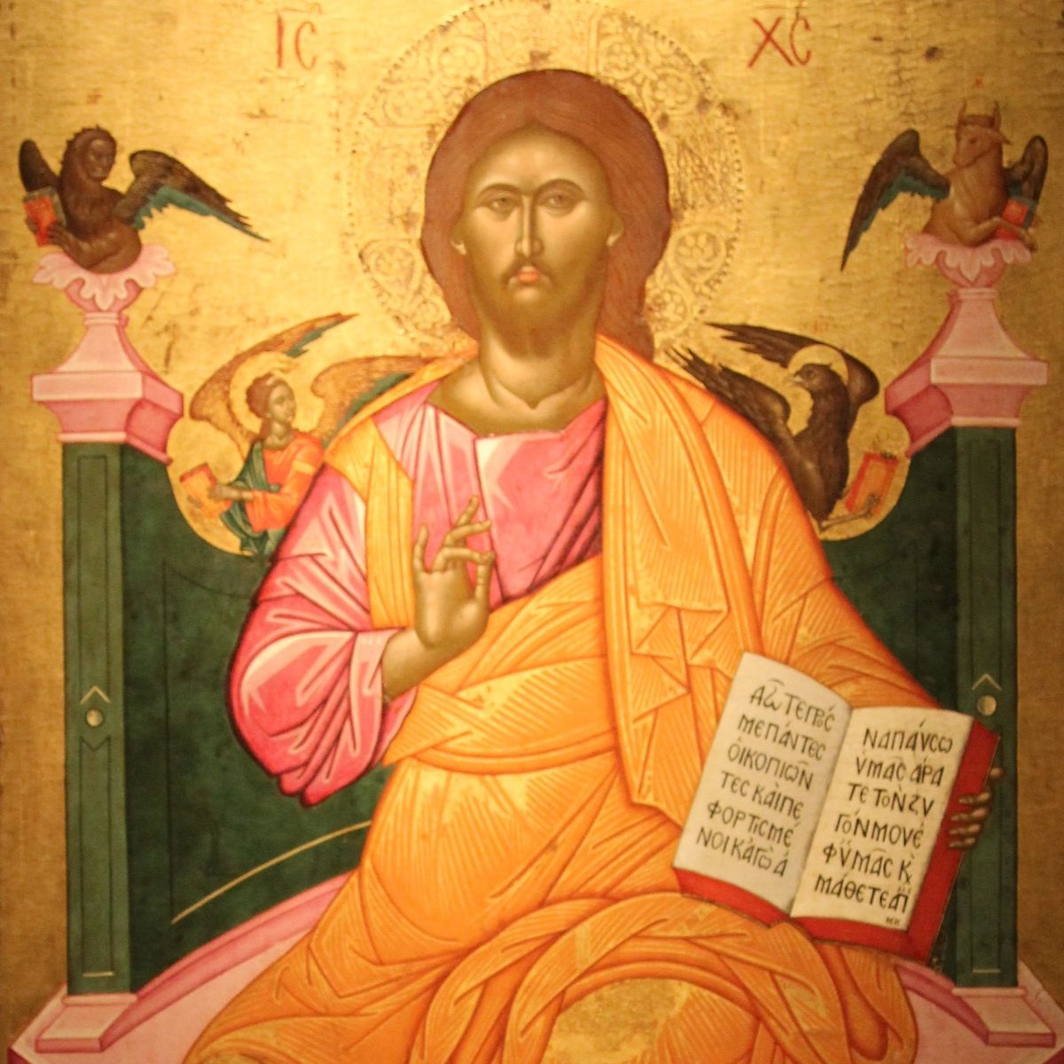 Orthodox icon depicting Jesus enthroned, making a sign of blessing, with images of the evangelists around his shoulder (a man for Matthew, a lion for Mark, an ox for Luke, and an eagle for John).