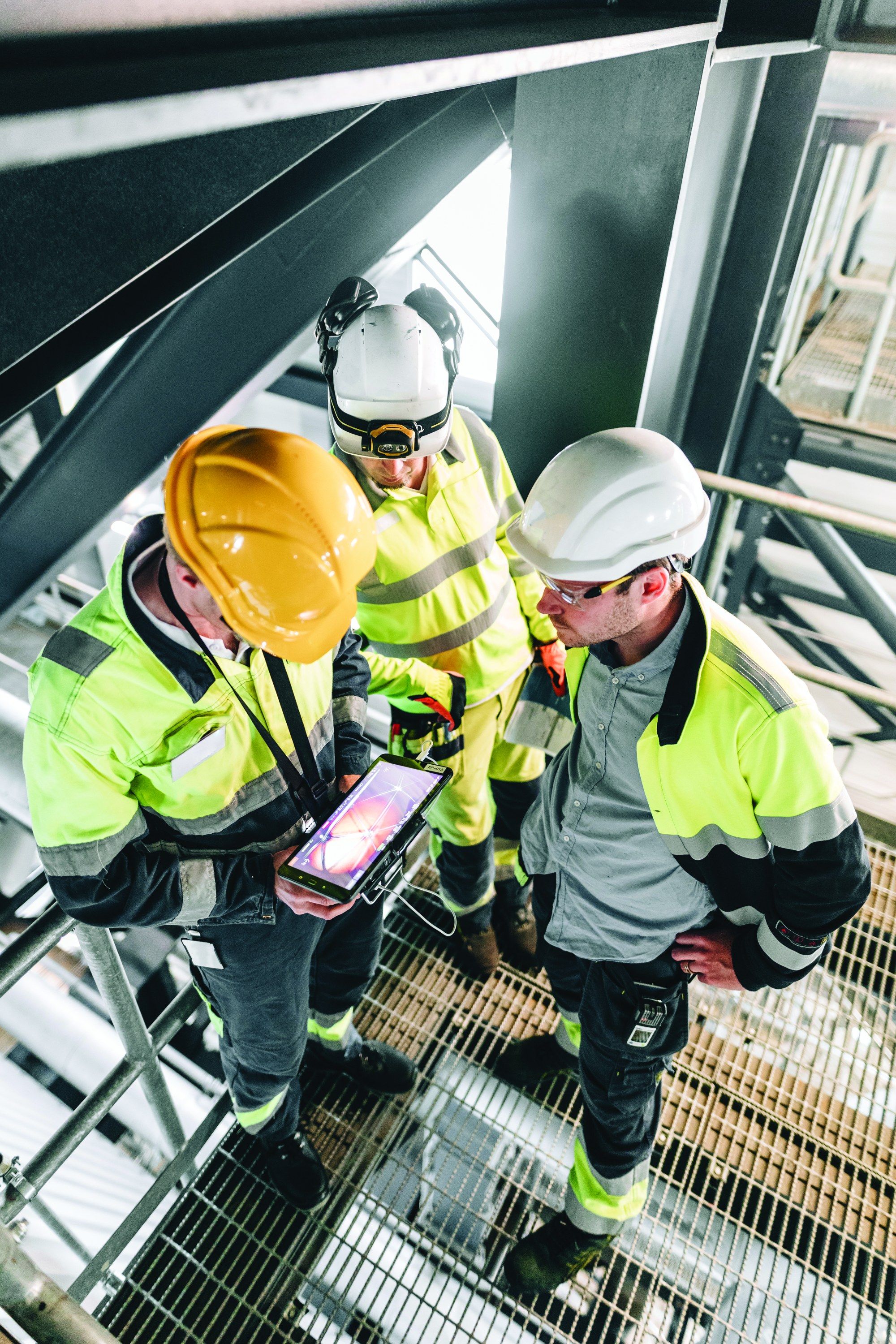 An engineer operates an inspection drone by remote control—one of the platforms reshaping how NDT professionals access difficult and hazardous structures eight decades after the Society’s founding. Drones now carry cameras, ultrasonic sensors, and other NDT payloads into spaces once reachable only by scaffolding, rope access, or borescope.