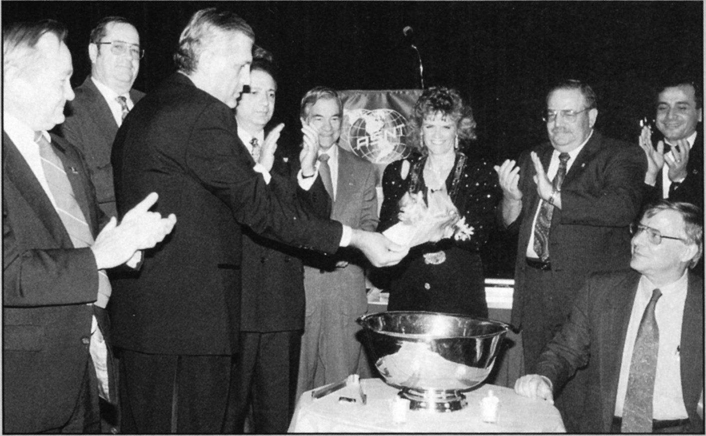 Past President Sotirios Vahaviolos presides over a mortgage burning ceremony during the 1994 Fall Conference in Atlanta, Georgia. ASNT paid off the mortgage on its Columbus headquarters more than 10 years ahead of schedule—a milestone that reflected both the Society’s financial discipline and the growth that had made its permanent home possible.