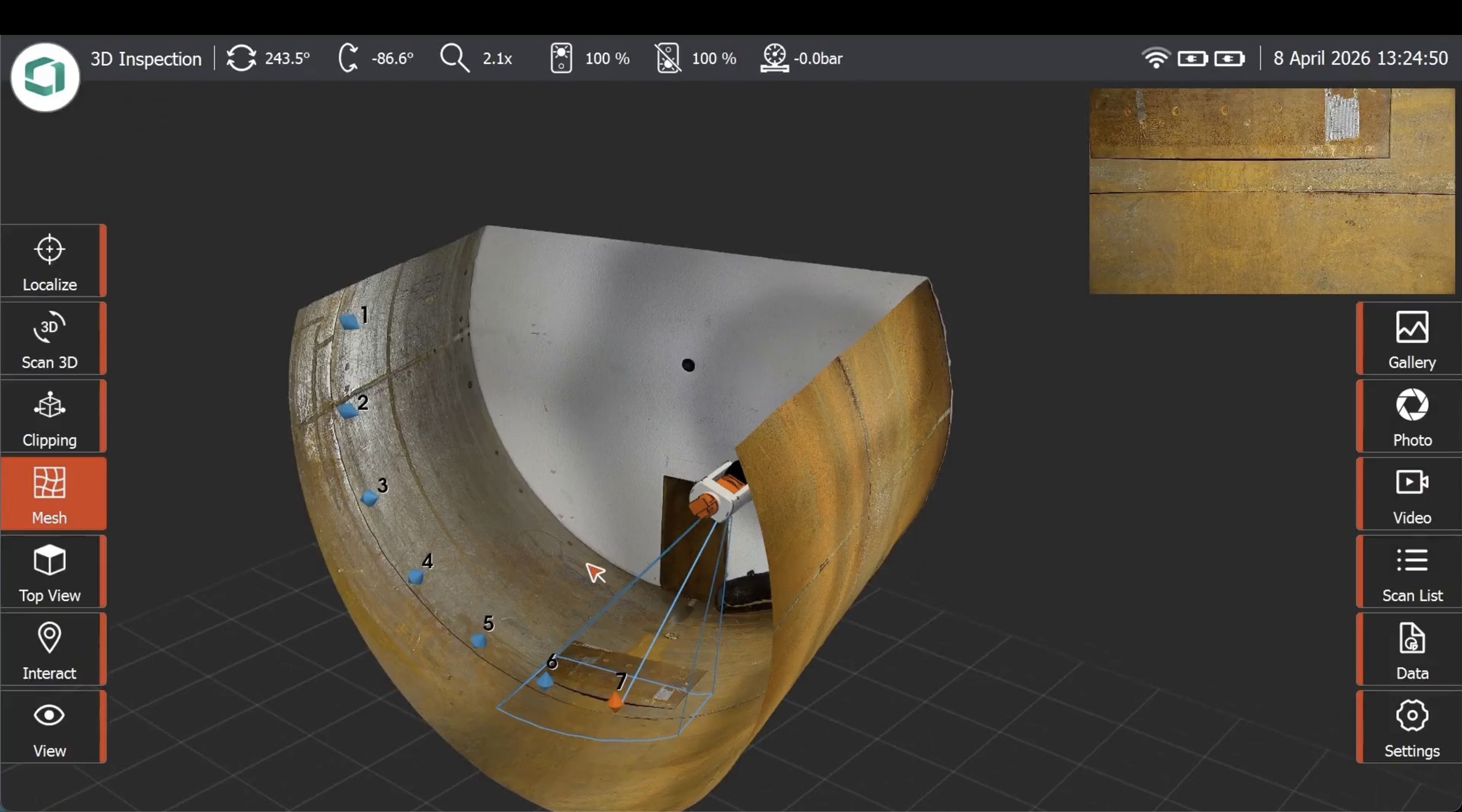 3D model inspection interface showing a partially scanned cylindrical object with marked points and various tool icons on the side.