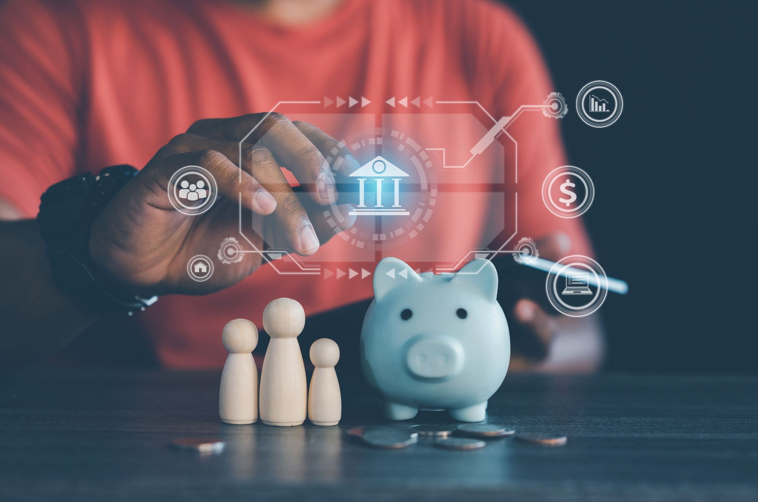 Hands interacting with digital financial icons next to a piggy bank and wooden family figures, symbolizing savings and financial planning.