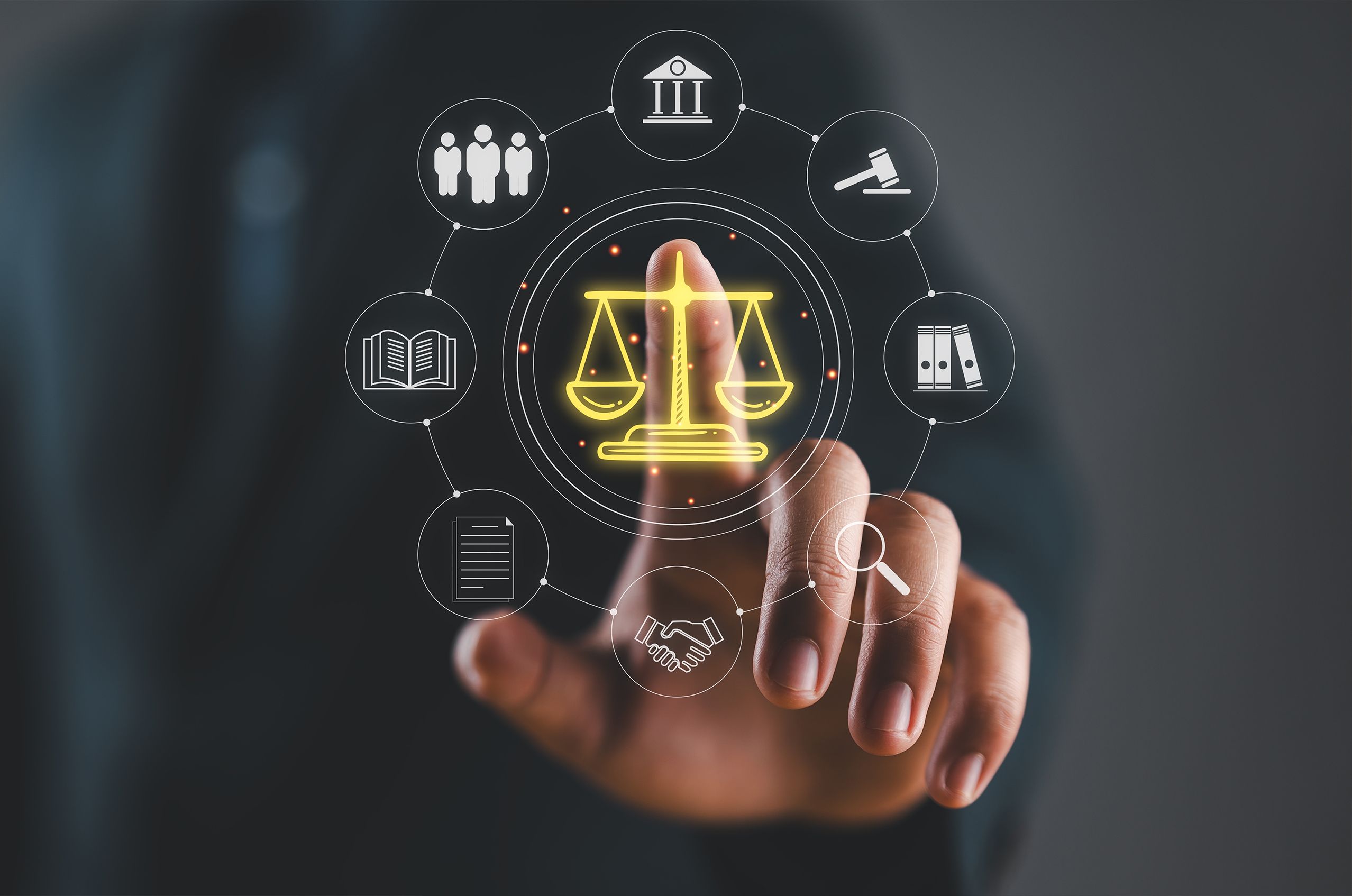 Person touching virtual icons representing ethics, including scales, gavel, books, and hands shaking, in a digital interface.