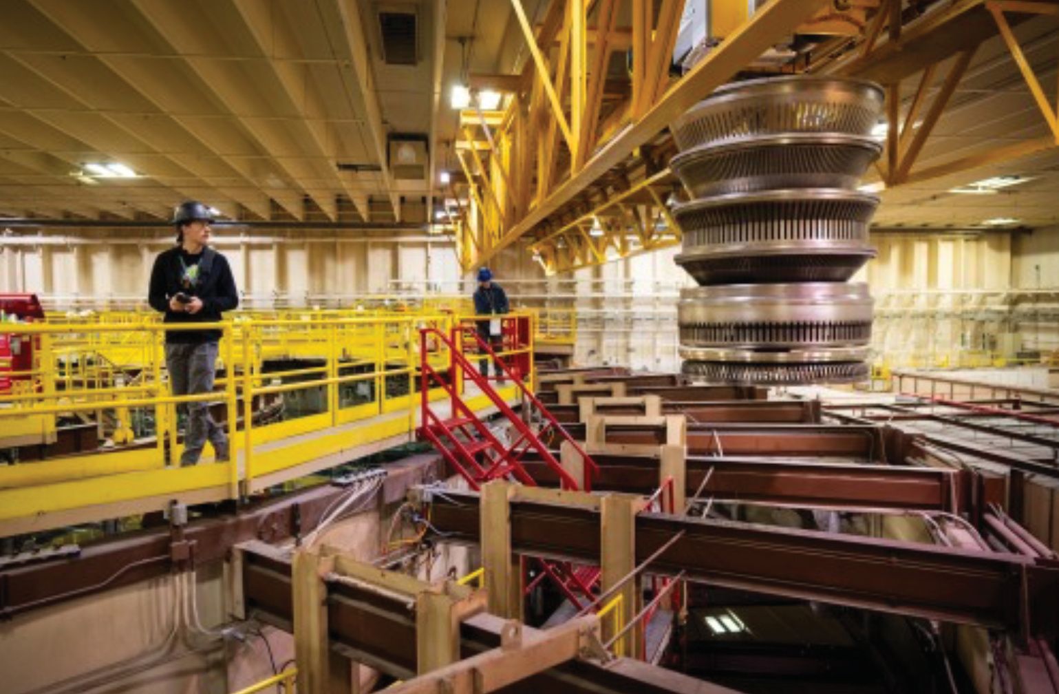 Sandia technologists transport the Saturn accelerator's transmission lines for cleaning