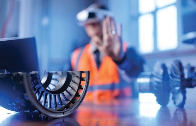 Inspector using VR headset with a turbine component