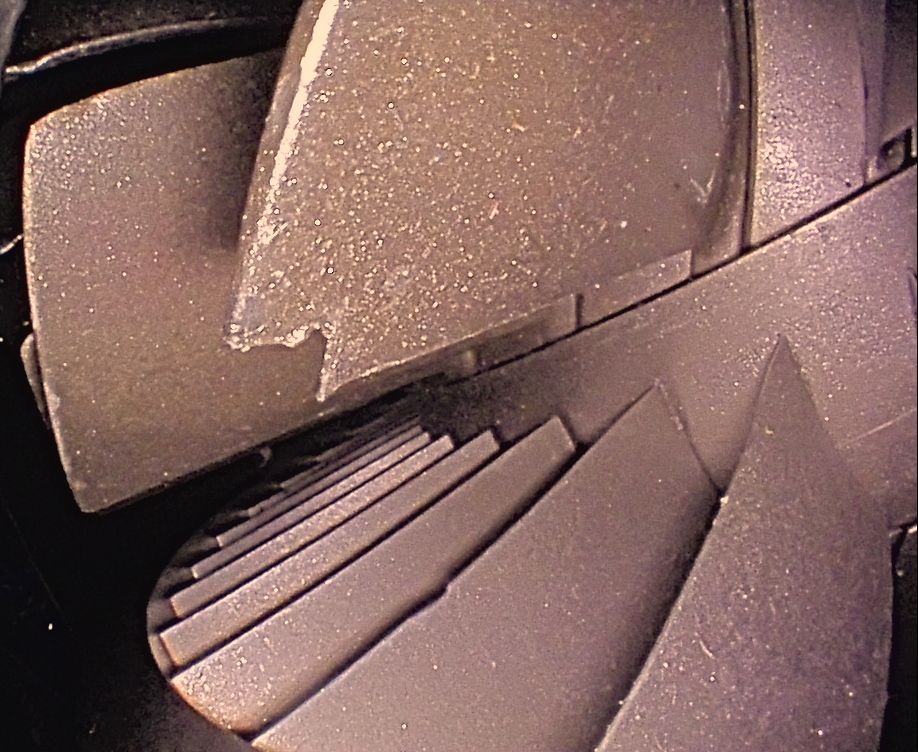 Close up of blades being inspected