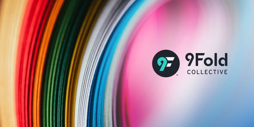 9Fold Collective logo on a photo background of folded, colored paper