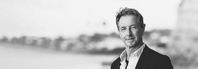 Steven Morris with a beach background