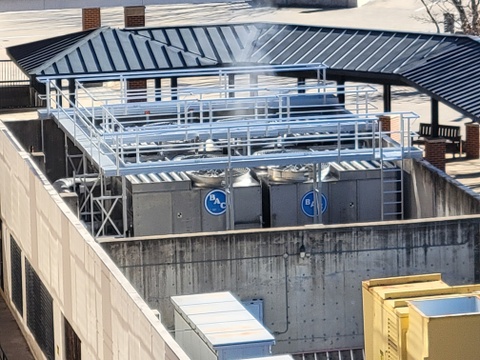 Kattsafe modular stair and platform system over rooftop cooling equipment at a data center