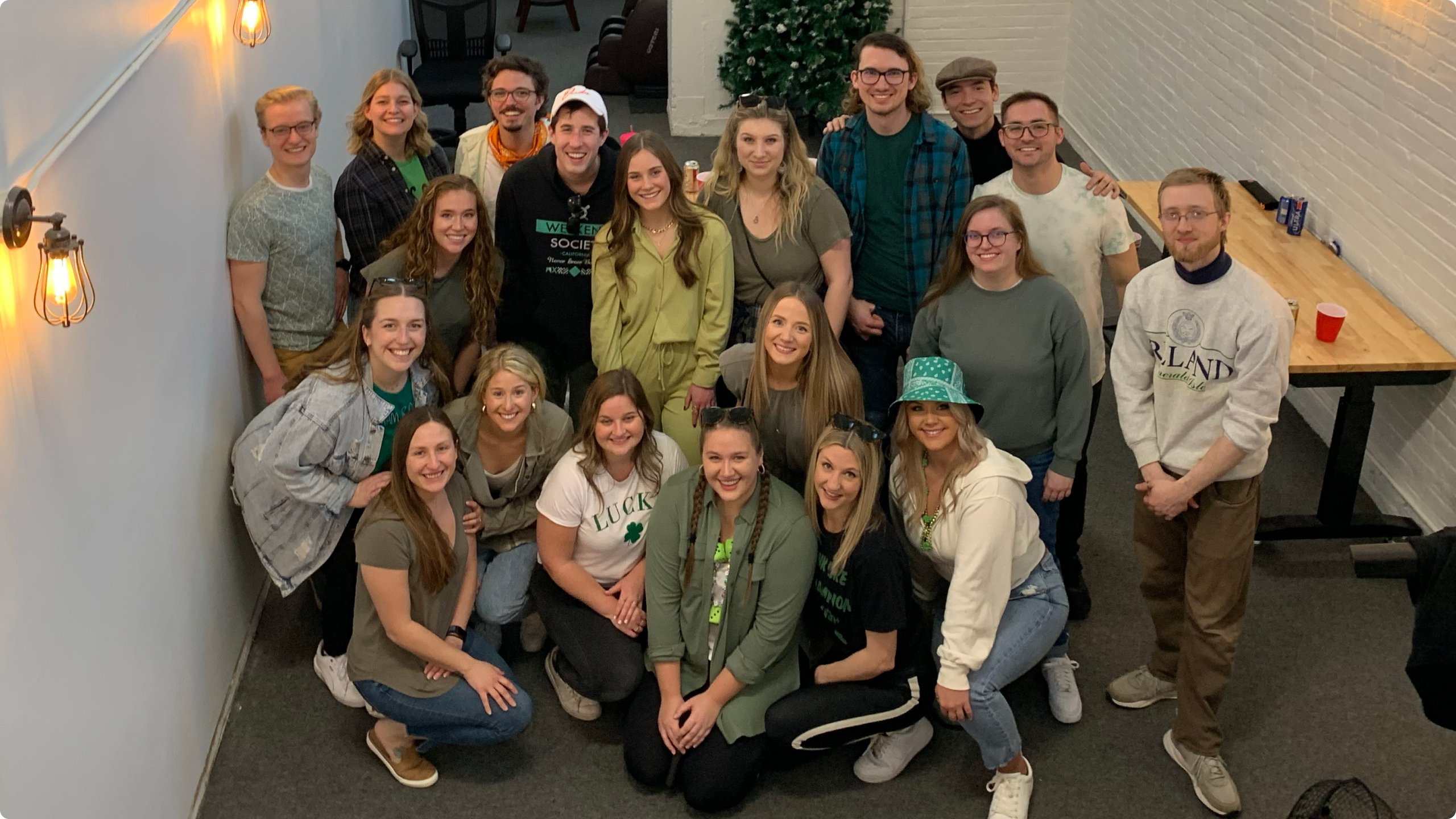 VividFront team members celebrating St. Patrick's Day 2023