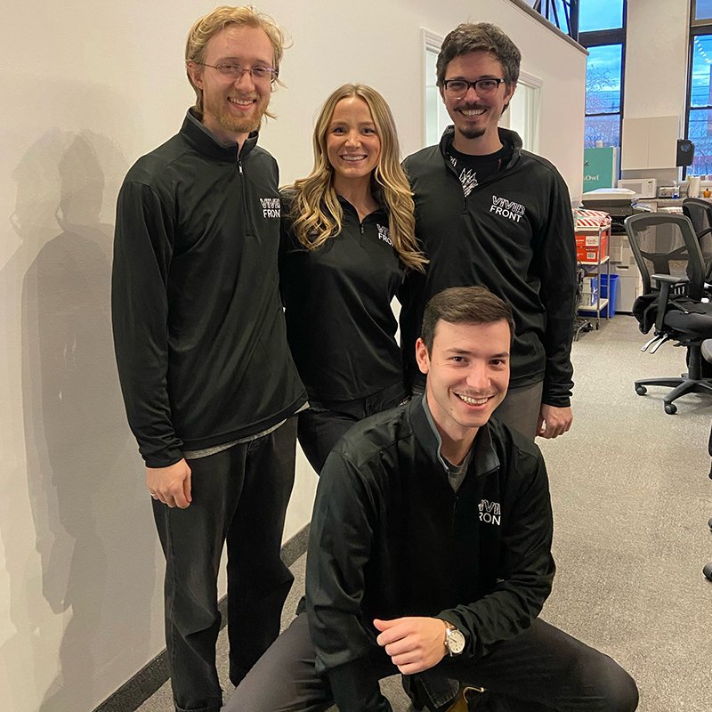 Vividfront team in matching quater zip pull overs