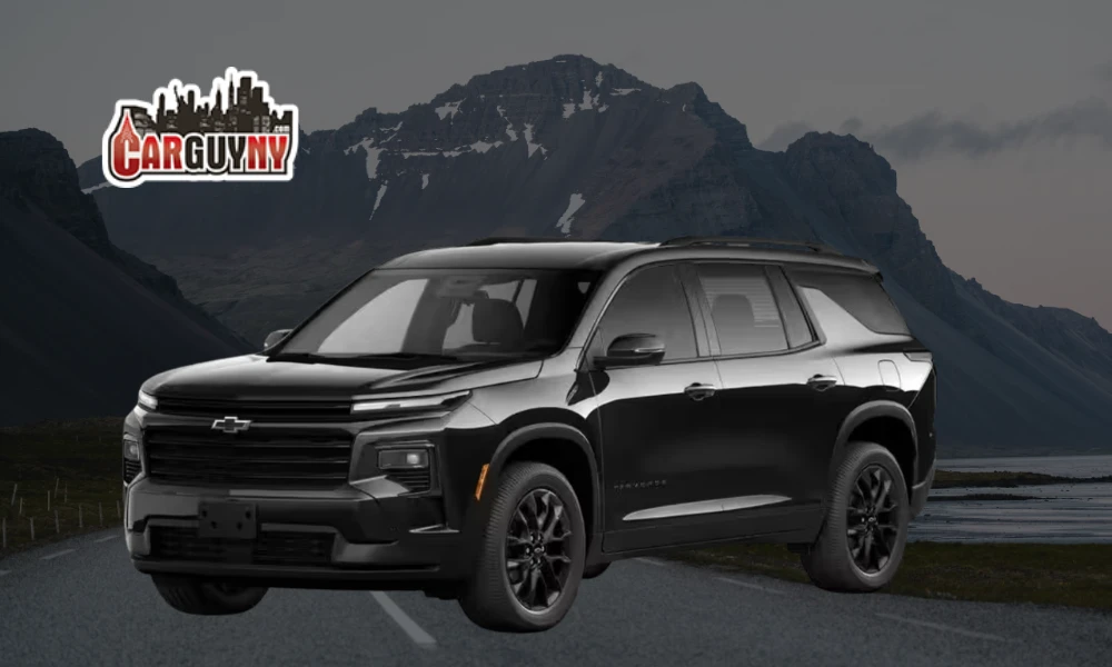 A black SUV parked on a mountainous road with a "CarGuyNY" logo in the corner.