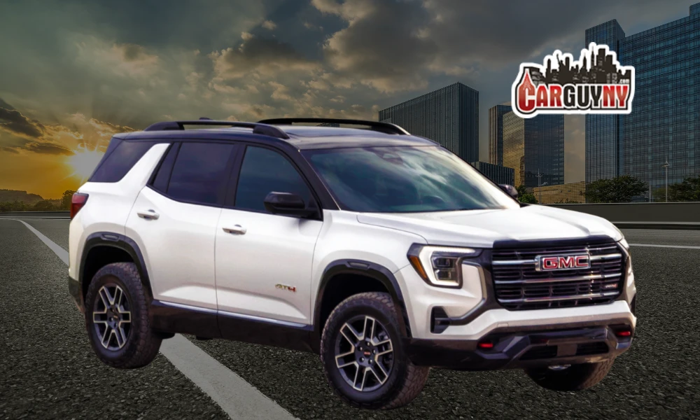A white GMC SUV parked on a city road at sunset, with skyscrapers in the background and "CarGuy.NY" logo above.
