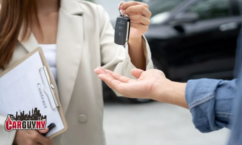 A person hands over car keys to another, with a clipboard labeled "Contract" in the background.