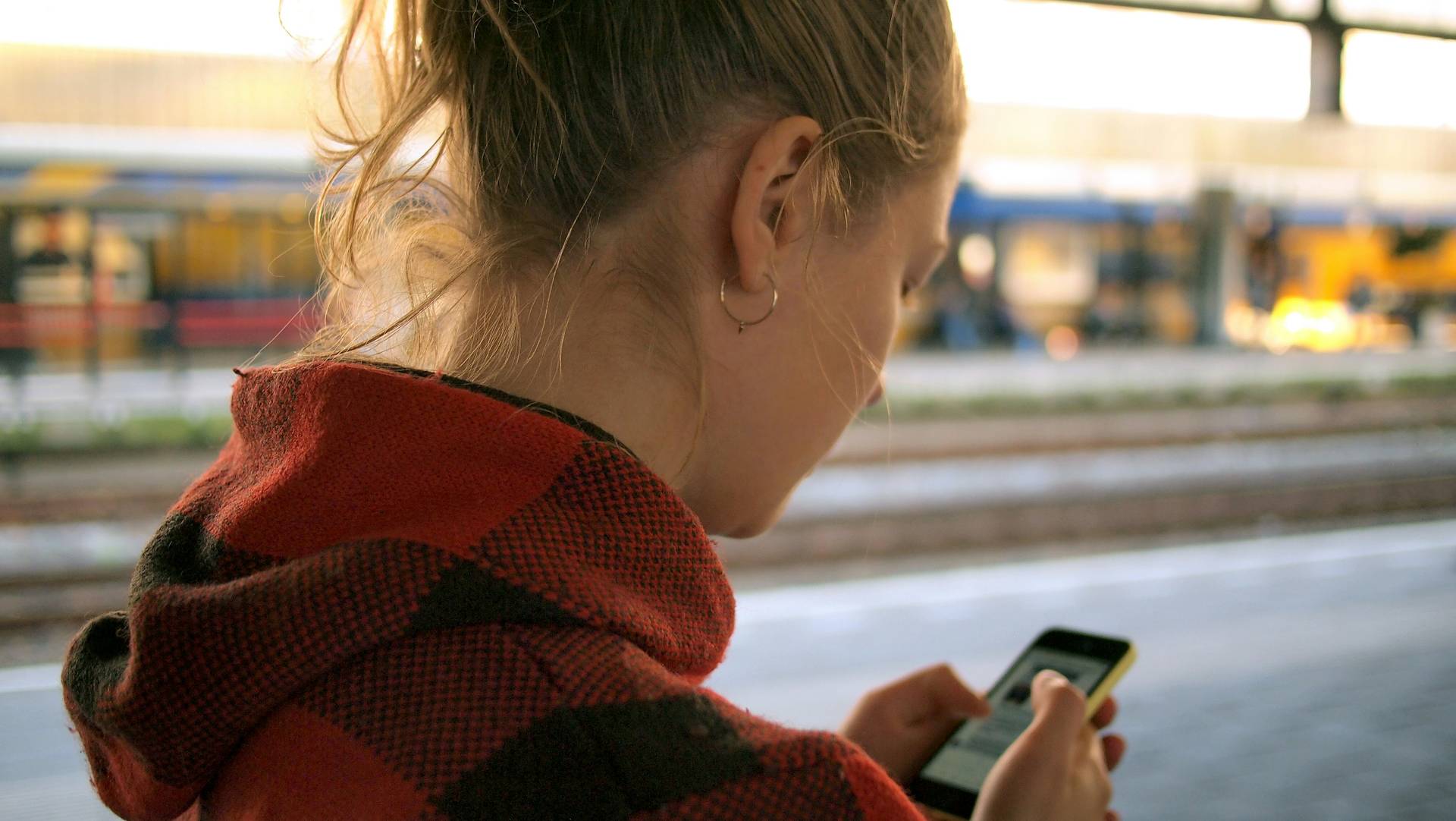 Person using their mobile phone