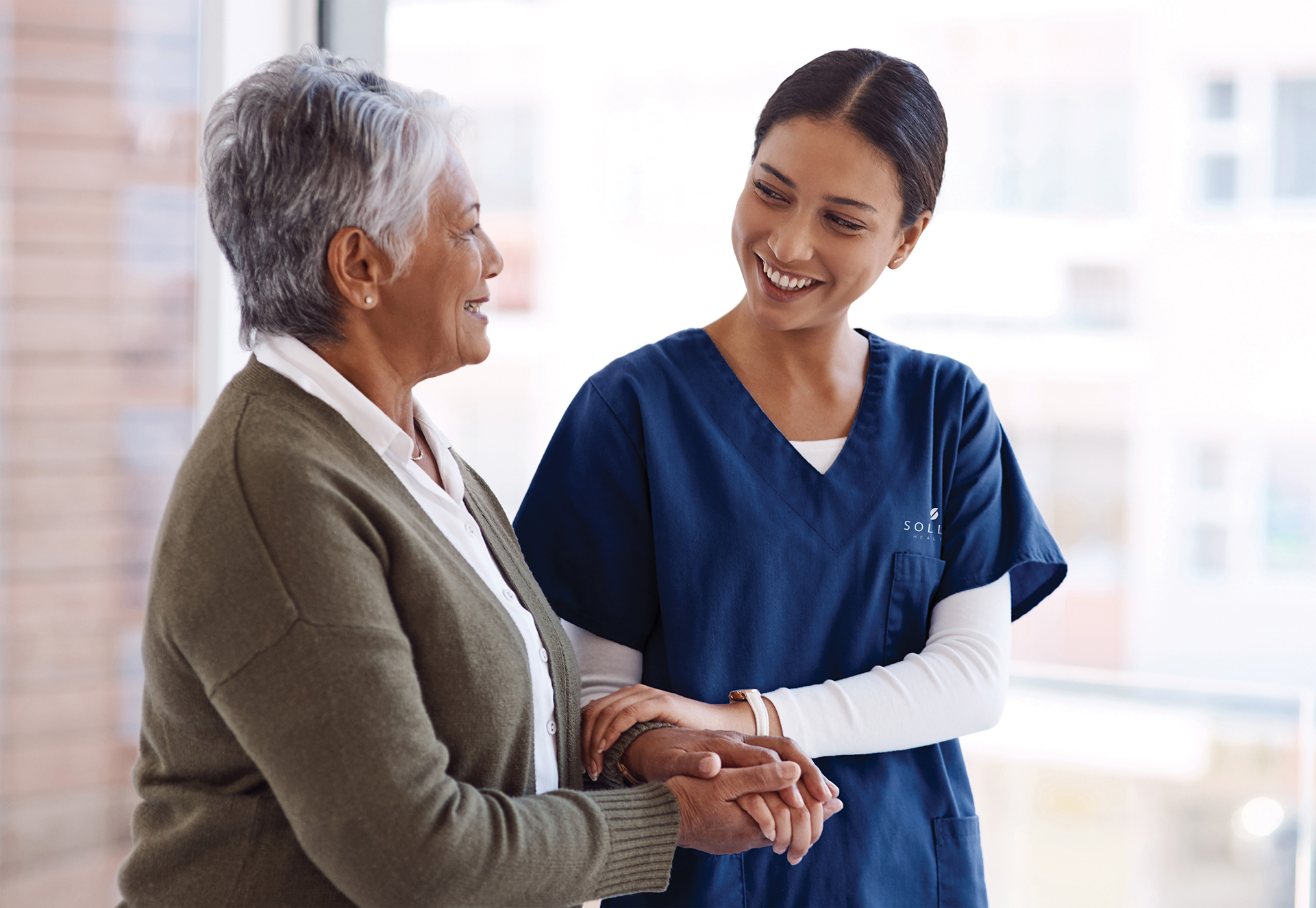 Senior resident being assisted