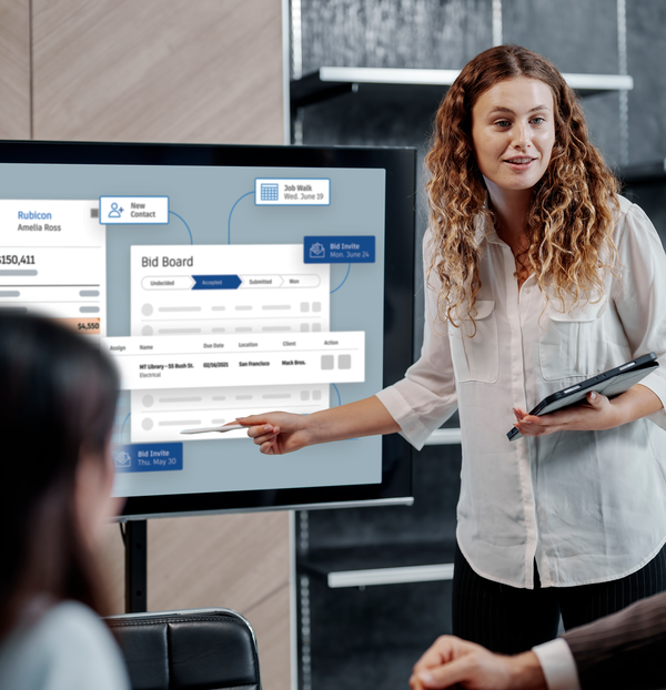 Office worker doing a demo of construction software