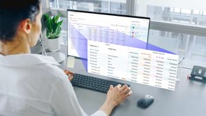 woman looking at Autodesk software