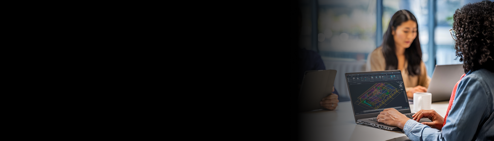 workers looking at construction software