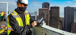 construction-worker-skyscraper-rooftop