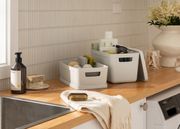 Inabox stylish modular containers used in modern laundry for storage and organisation