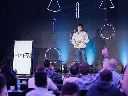 Derek taking the stage at all-hands