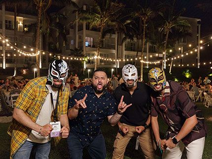 Luchadores at the all-hands meeting