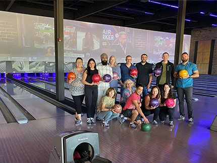Legal, IT and finance teams go bowling