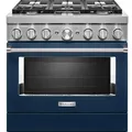 Blue KitchenAid gas range with stainless steel knobs and a large oven door, featuring a five-burner stovetop.