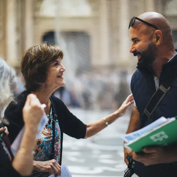 traveler and tour director chatting