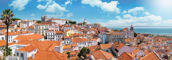 blue skies in portugals alfama district