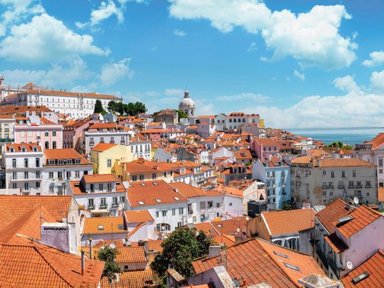 blue skies in portugals alfama district