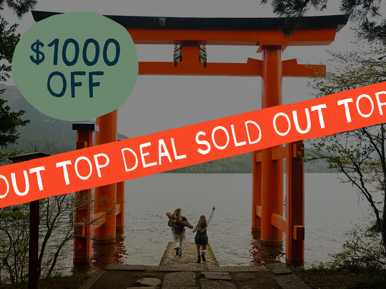 A torii gate by a lake, with two people walking towards it. A "$1000 OFF" sign and "SOLD OUT TOP DEAL" banner overlay the image.